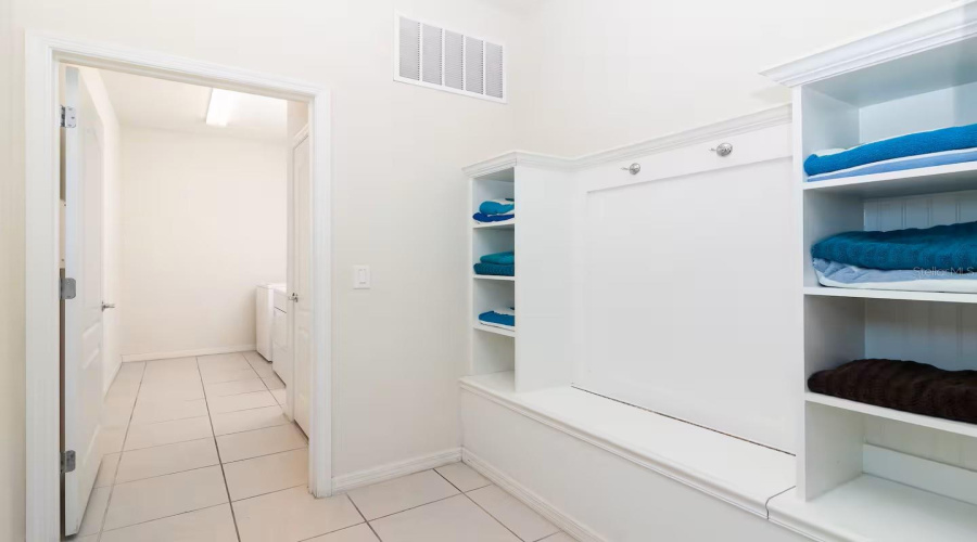 ENTRY SITTING NEXT TO LAUNDRY