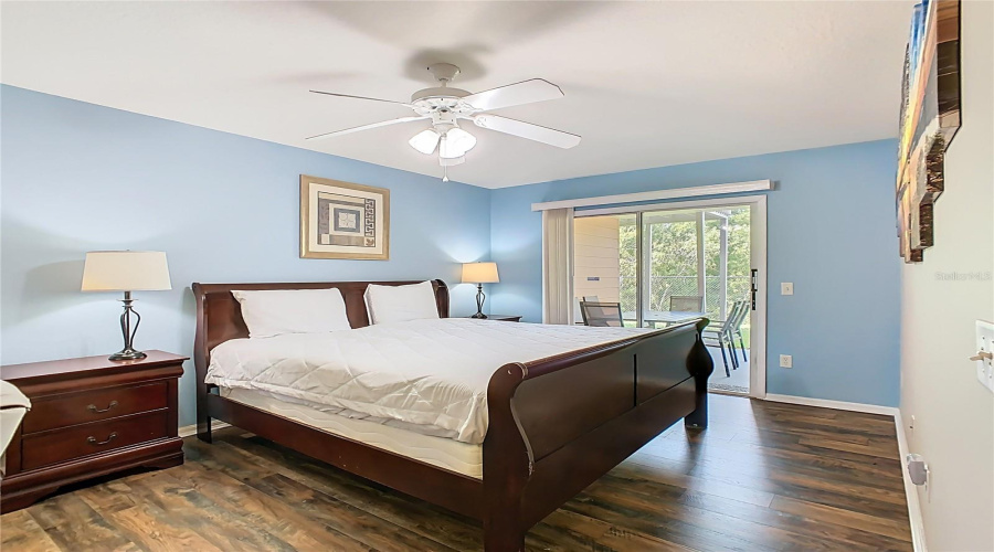 Second ensuite bedroom with sliding door access to covered lanai. Updated, tastefully decorated and well maintained.