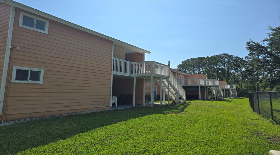 Back of unit. More green space backing to wooded area.