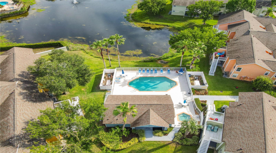 Clubhouse #1 pool & spa. Pond with water fountain feature.