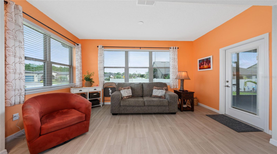 Florida Room Extends Living Space And Has Access To Back Lanai.