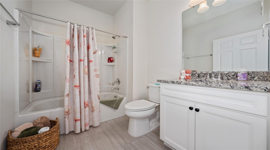 Guest Bathroom With Tub And Shower, Granite Counter