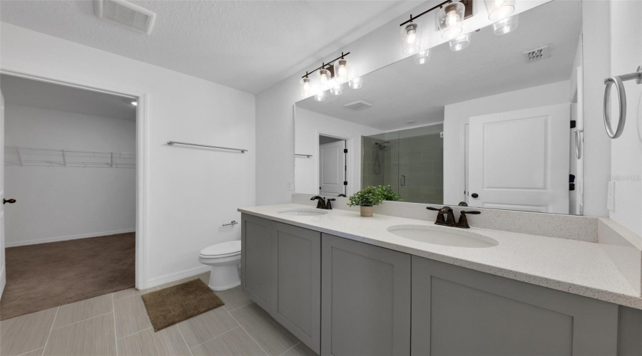 Upstairs - Primary Bathroom and extra large walk-in closet