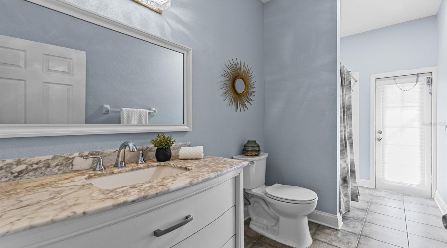 Bathroom Leading To The Pool Area