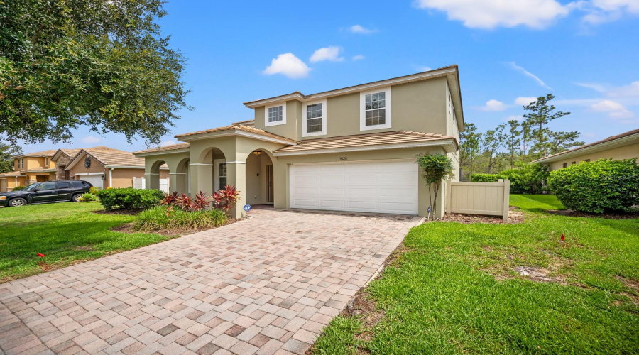 Pride Of Ownership Shines Through As You Pull Onto The Paved Driveway