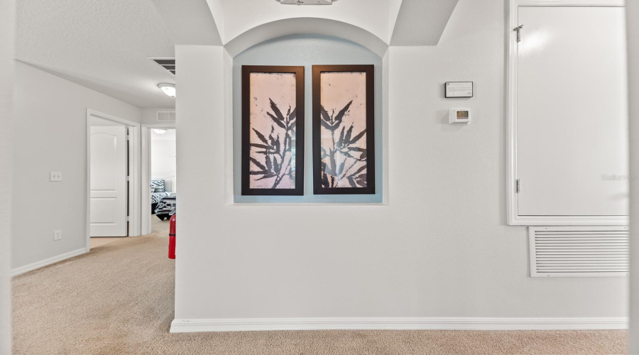 Top Of Stairs Leading To Loft And Additional Bedrooms