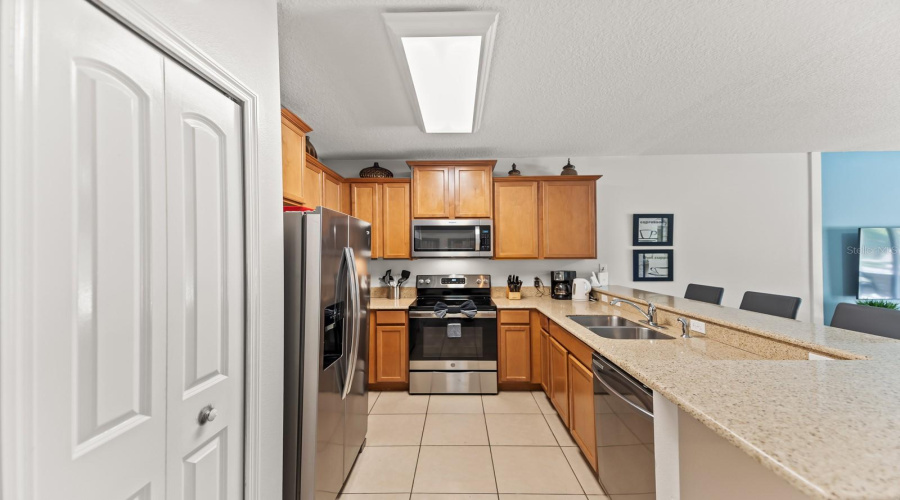 Heart Of The Home!  This Kitchen Benefits From Stainless Appliances, Pantry And Granite Counter Tops.