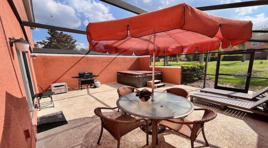 Screened Lanai With Spa, Bbq And Sitting Areas
