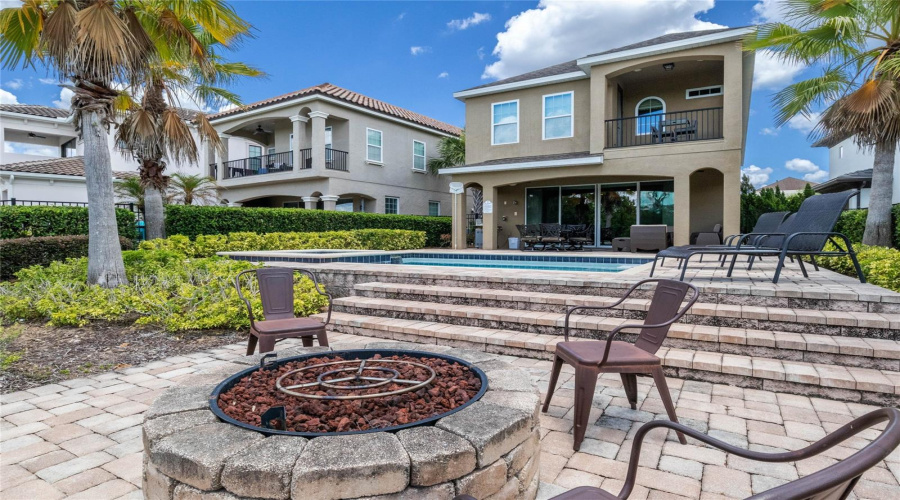 Expansive Pool Deck With Fire Pit