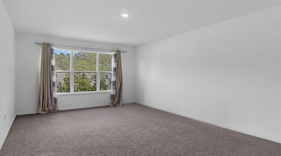 Virtually stagedPrimary bedroom downstairs