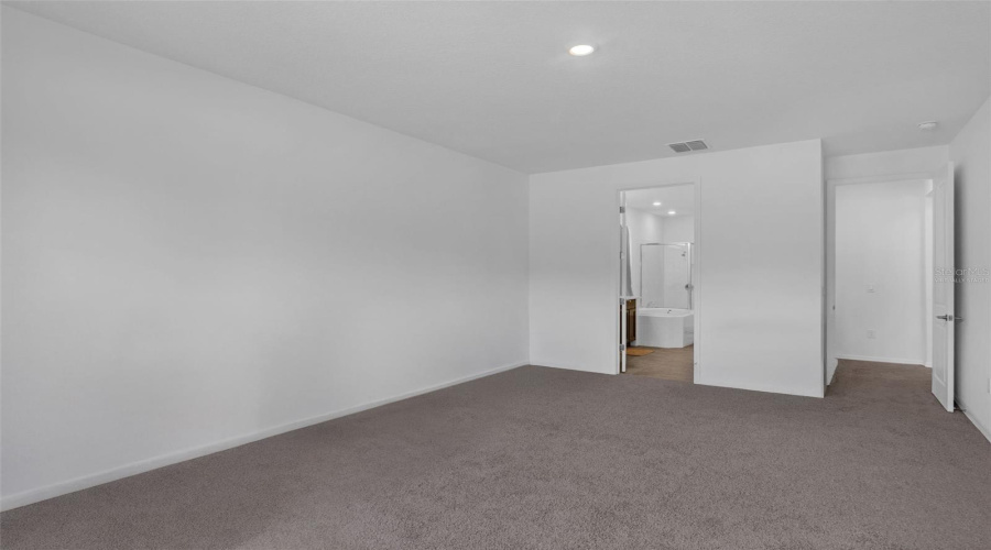 Virtually stagedPrimary bedroom downstairs