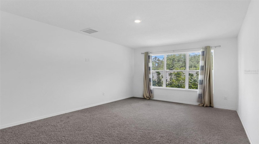 Virtually stagedPrimary bedroom downstairs