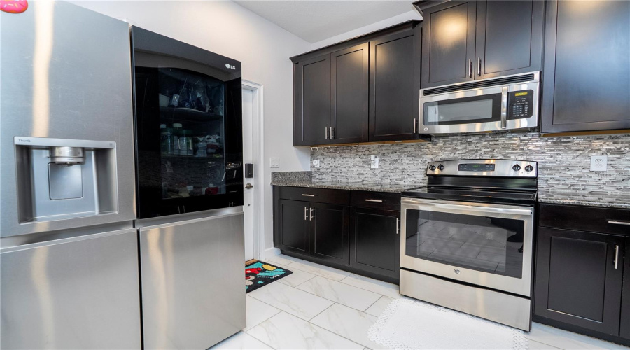 DAVENPORT, Florida 33896, 6 Bedrooms Bedrooms, ,5 BathroomsBathrooms,Residential,For Sale,SHINNECOCK HILLS,0,MFRO6314608