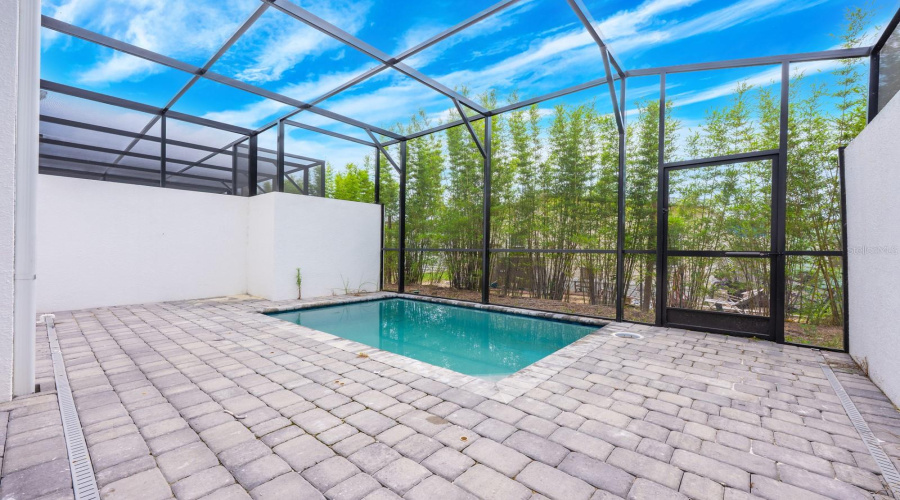 Enjoy your own PRIVATE SCREENED LANAI with a SPARKLING POOL, perfect for relaxing or entertaining in the Florida sunshine.