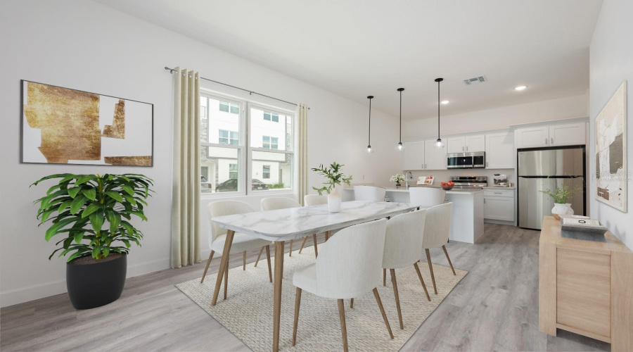 A well-placed Dining area provides a comfortable setting for relaxed dining and conversation. Virtually staged.