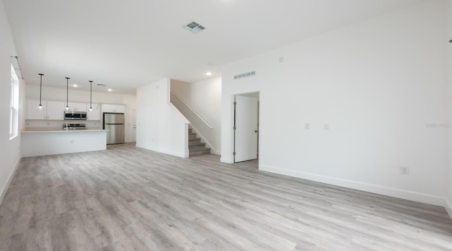 Built in 2023 and boasting over 2,000 SQUARE FEET of sleek, contemporary design, this beautifully appointed home offers flexibility as a primary residence, vacation retreat, or income-generating short- or long-term rental.