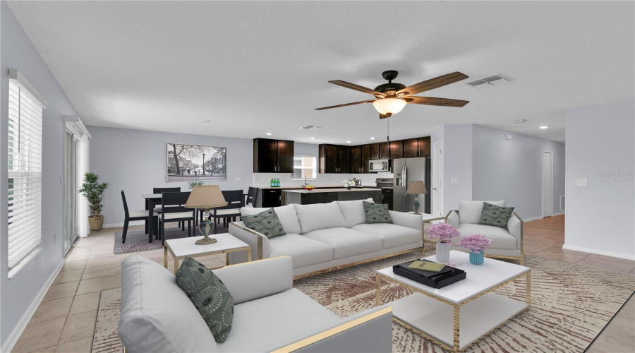 Open-concept living room, virtually staged for style and comfort
