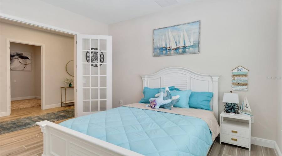 Bedroom 3 with a walk- in closet