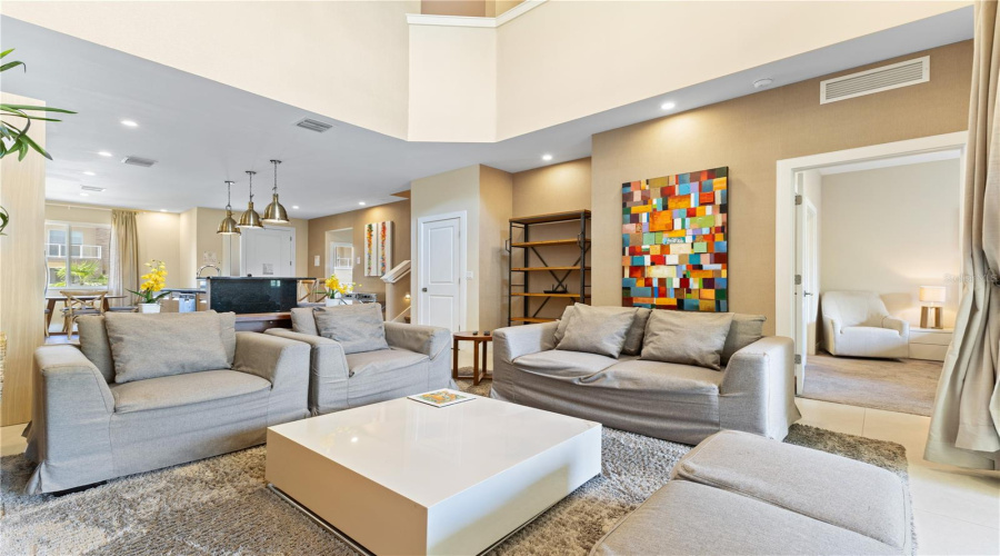 Living area showing Master Bedroom downstairs.