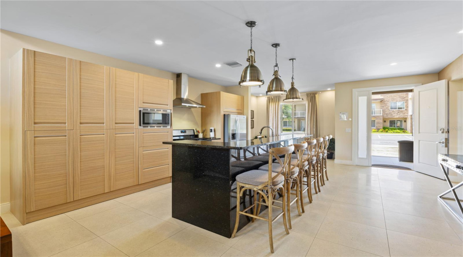 Kitchen showing front door.