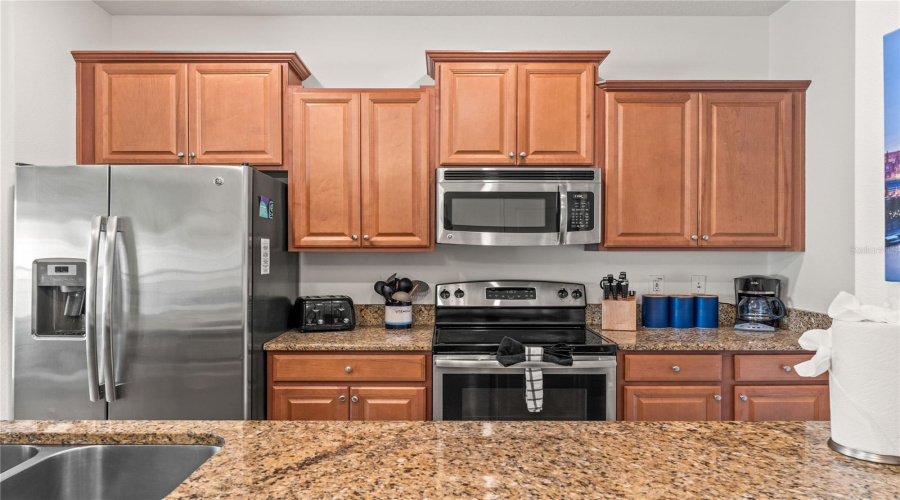 Kitchen with stainless steel appliances and granite countertops