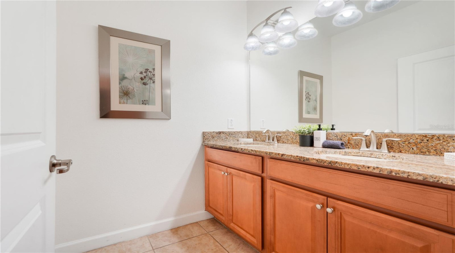bathroom with granite countertops