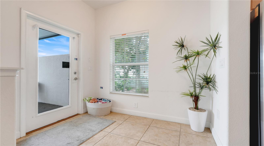 Back door leading to lanai and private pool