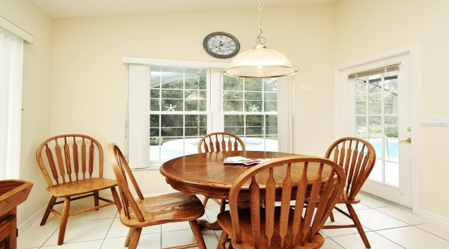 Eat-in Kitchen Area with view of Pool Lanai