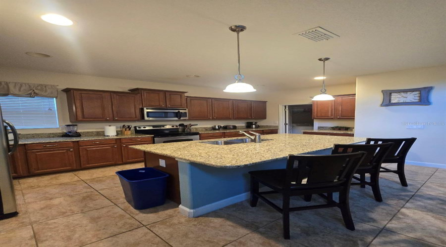KISSIMMEE, Florida 34747, 5 Bedrooms Bedrooms, ,5 BathroomsBathrooms,Residential,For Sale,CUBAN PALM,0,MFRTB8400109
