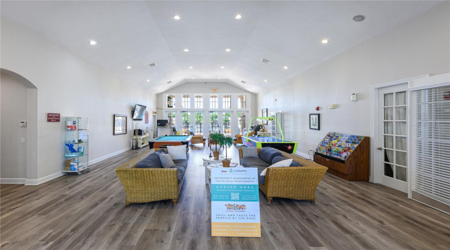Clubhouse with Fitness Center, Bathrooms, Library, Air Hockey, Pool Table, and Ping Pong Table.