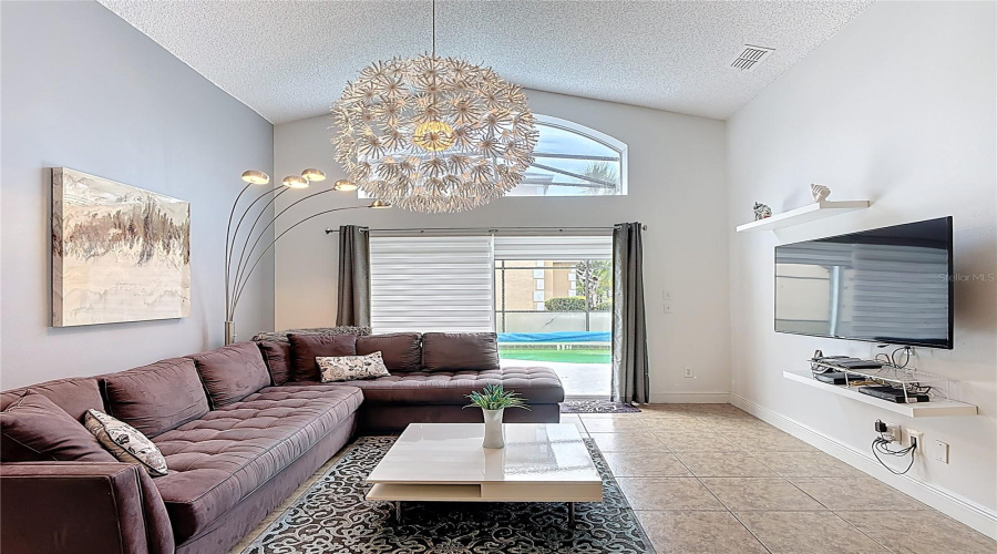Family room overlooking patio and pool