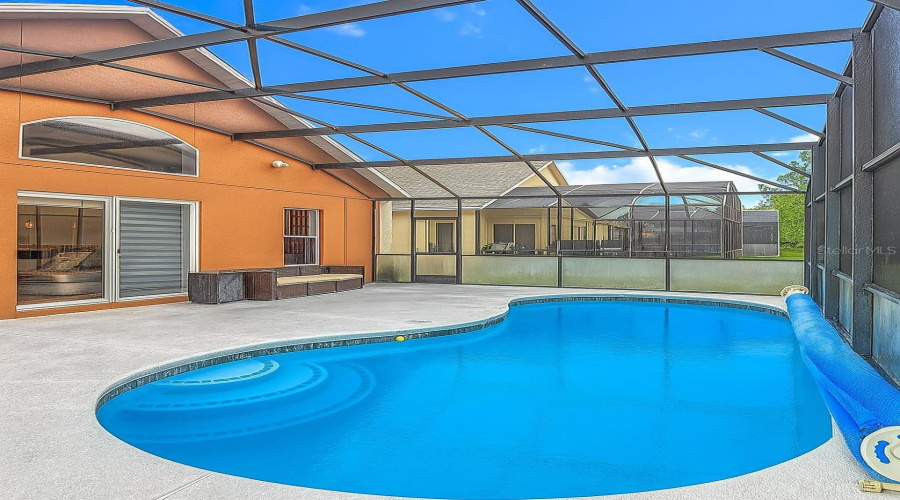 Screened in pool and patio perfect for entertaining