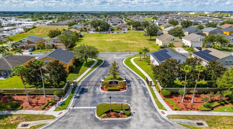 Gated Entrance & Community ConnectionWelcome home to a beautifully landscaped gated entrance with access to a sister neighborhood featuring tennis courts, a basketball court, and a fun kids' park just moments away!Español:Entrada Privada y Comunidad Conectada¡Bienvenido a casa! Disfruta de una entrada privada rodeada de hermosos jardines y acceso a la comunidad vecina que ofrece canchas de tenis, baloncesto y un parque infantil para disfrutar en familia.