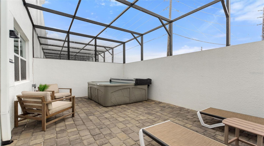 Lanai area with hot tub.
