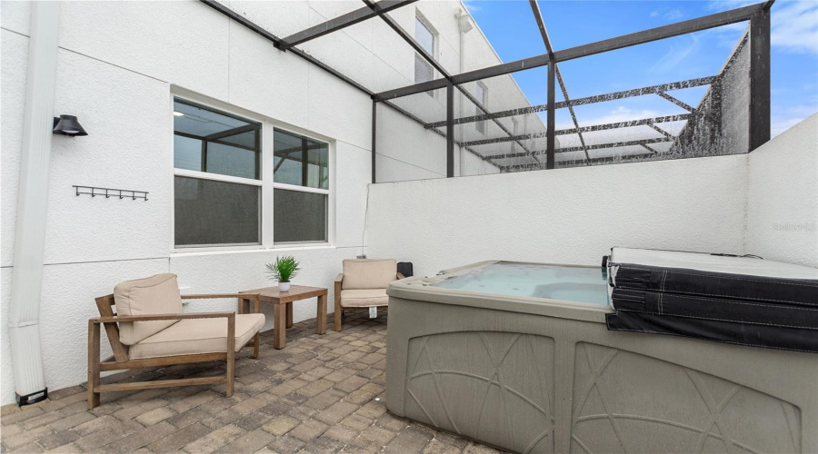 Lanai area with hot tub.