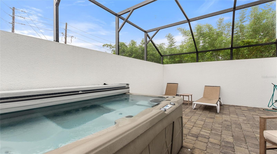 Lanai area with hot tub.
