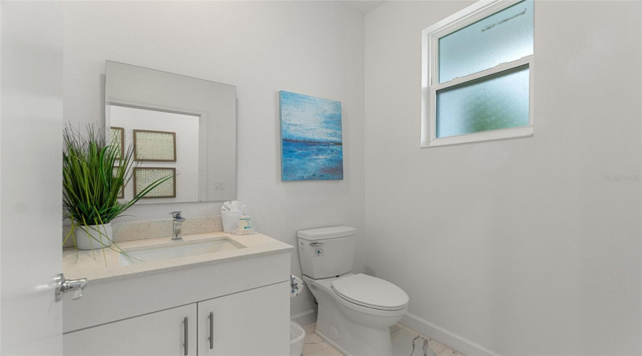 Convenient downstairs half bath.