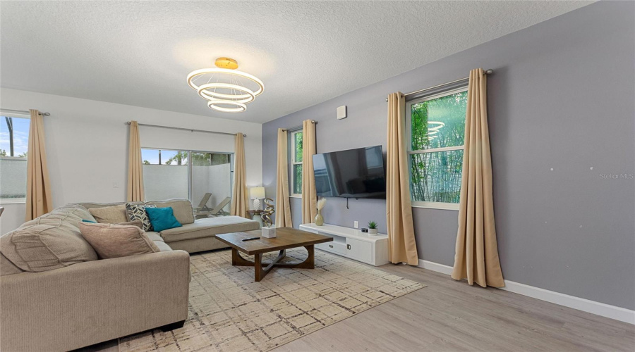 Beautifully furnished living room with plenty of seating!!