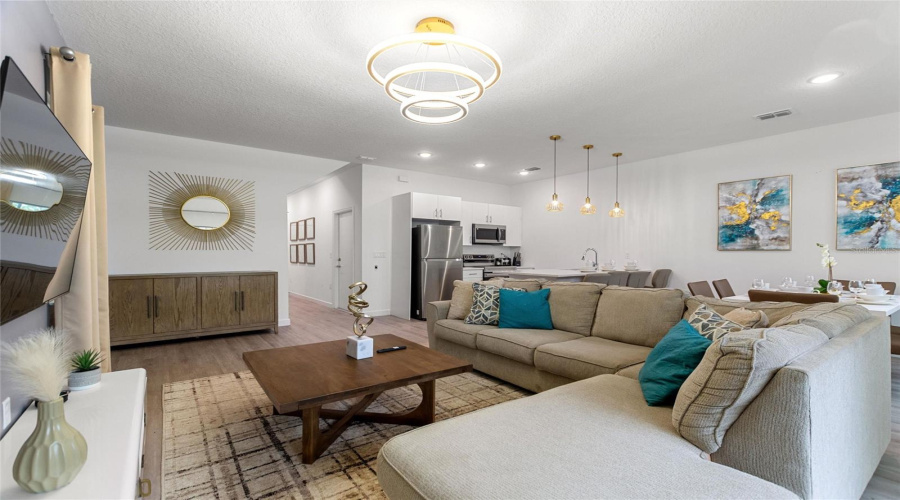 Beautifully furnished living room with plenty of seating!!
