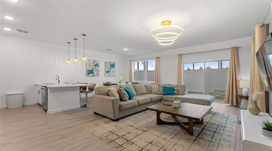Beautifully furnished living room with plenty of seating!!