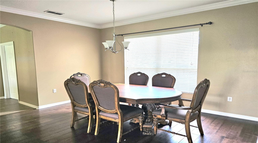 Separate Dining Room with Crown Molding