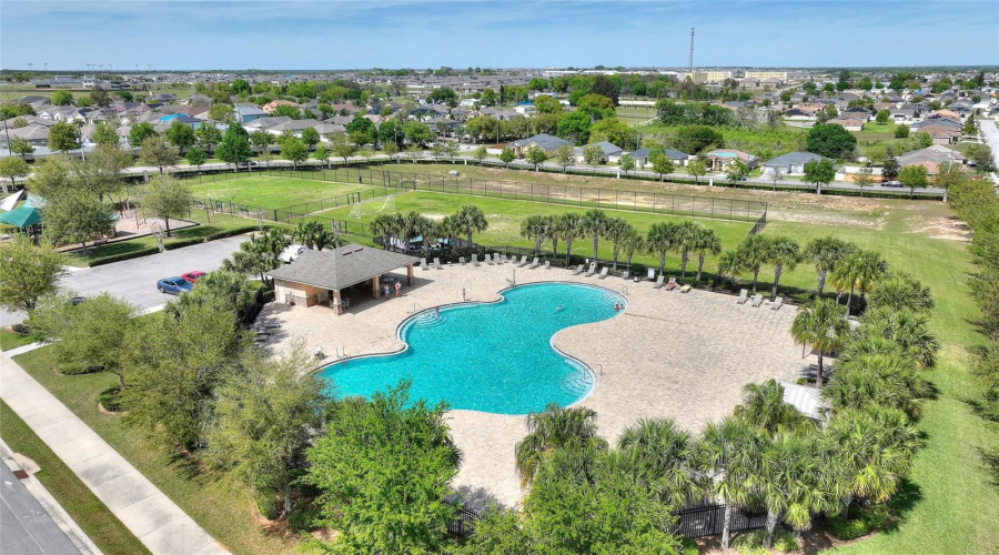 Community pool with cabanas