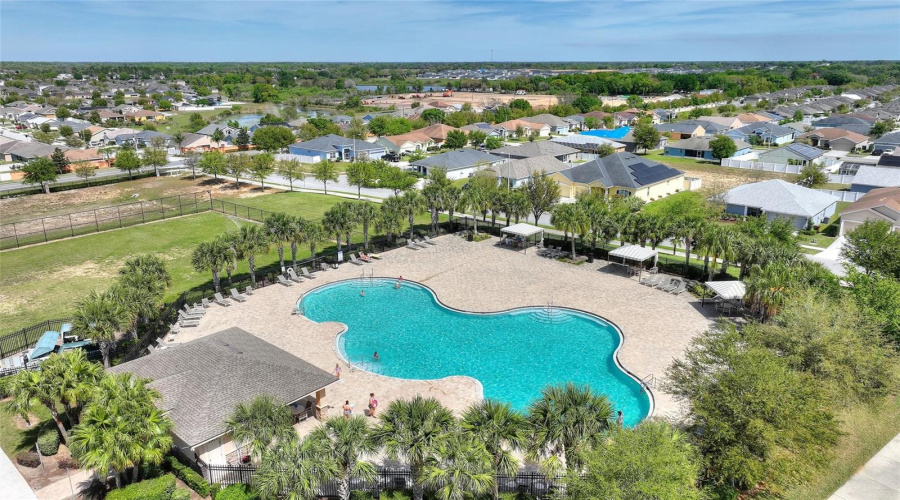 Community pool with cabanas