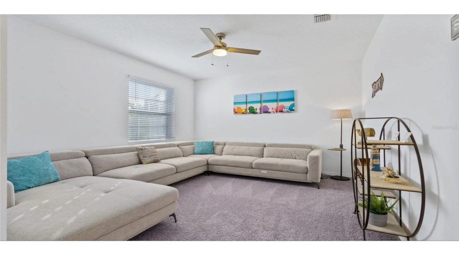 Currently used as a relaxation room, a very versatile room that could also be used as a den/ office/ study