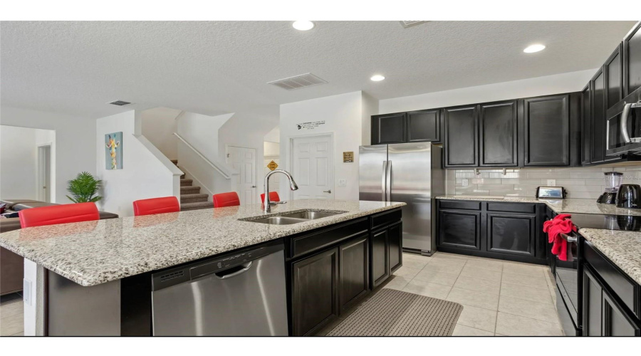Beautiful center island with stainless steel dishwasher