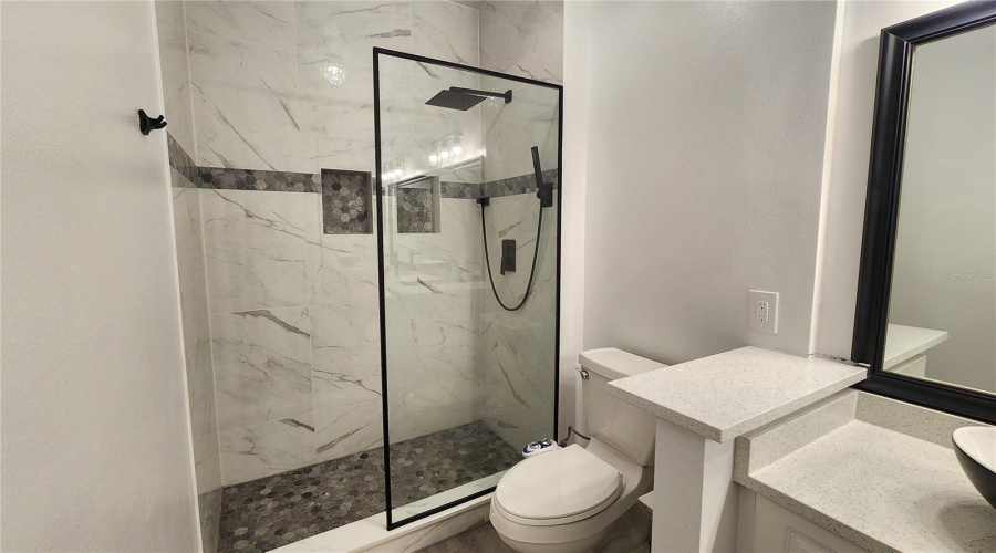 WALK-IN SHOWER W/ RAIN SHOWER HEAD!