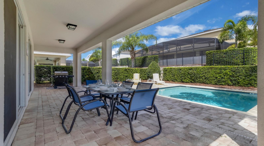 Pool with cover and upgraded pavers