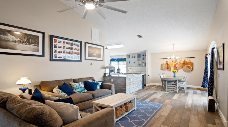 The living/dining room area is located at the back of the home.