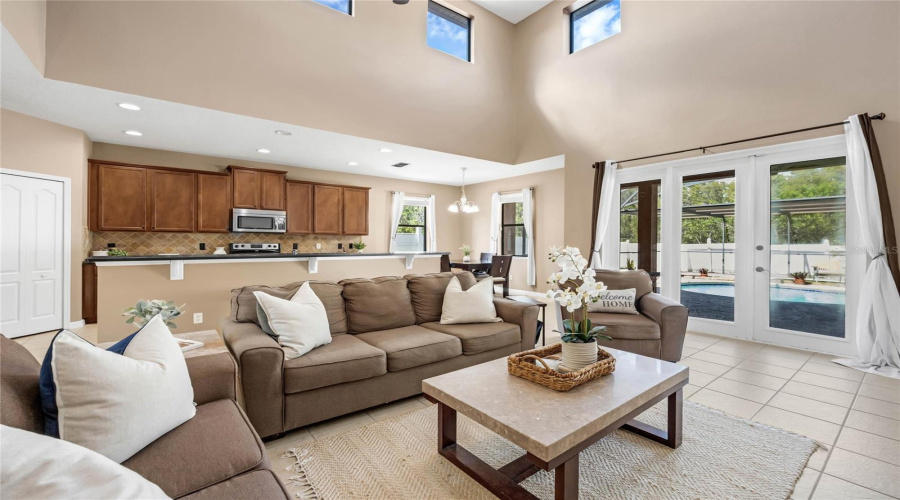 High Ceilings Family Room/Kitchen & Dining Area