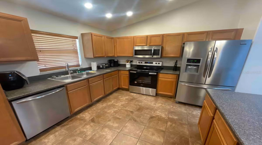 KISSIMMEE, Florida 34747, 5 Bedrooms Bedrooms, ,4 BathroomsBathrooms,Residential,For Sale,ROARING CREEK,0,MFRO6323037